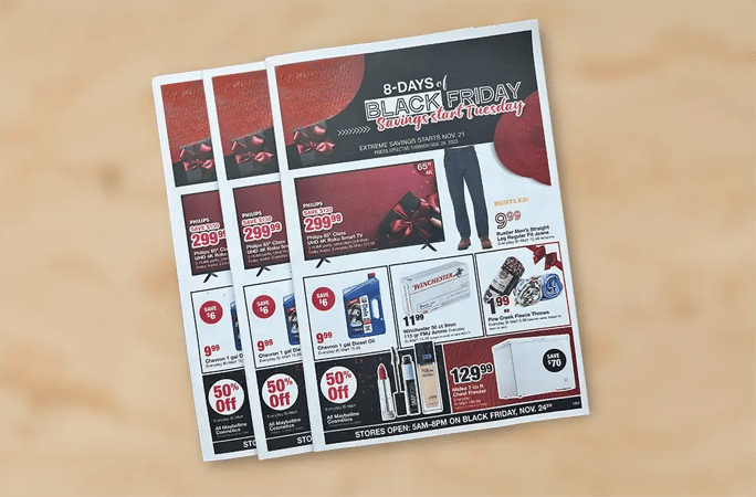 spread of retail circulars against a neutral background